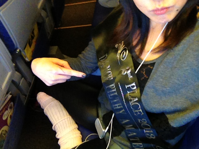 So here I am in my sash, shamelessly posing on my flight back home to Singapore. Gotta be glad that no one was sitting in my row!